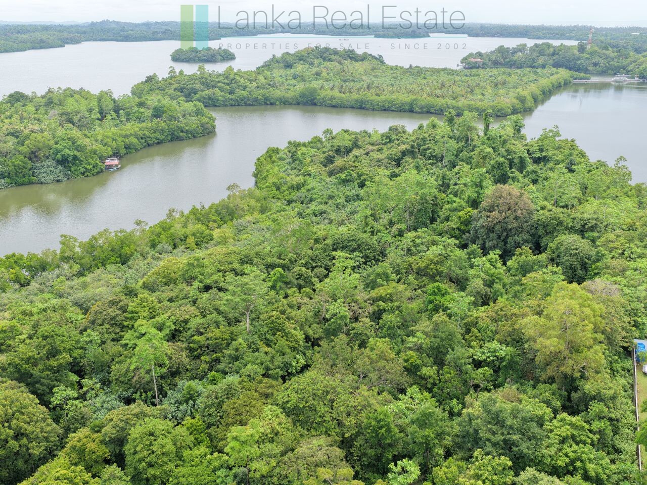 Serene wooded six acres on Koggala Lake