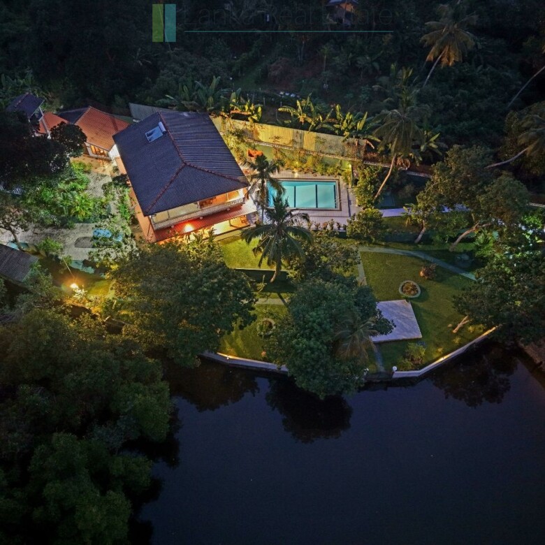 Secluded lakeside villa with private shoreline