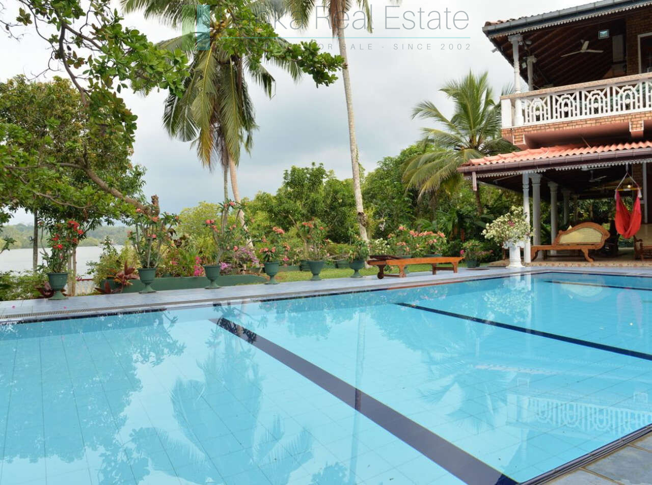 Secluded lakeside villa with private shoreline