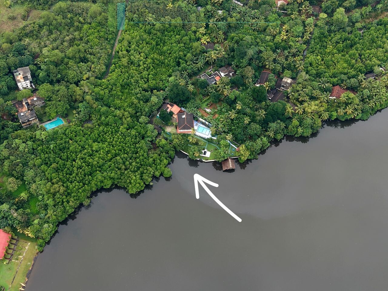 Secluded lakeside villa with private shoreline