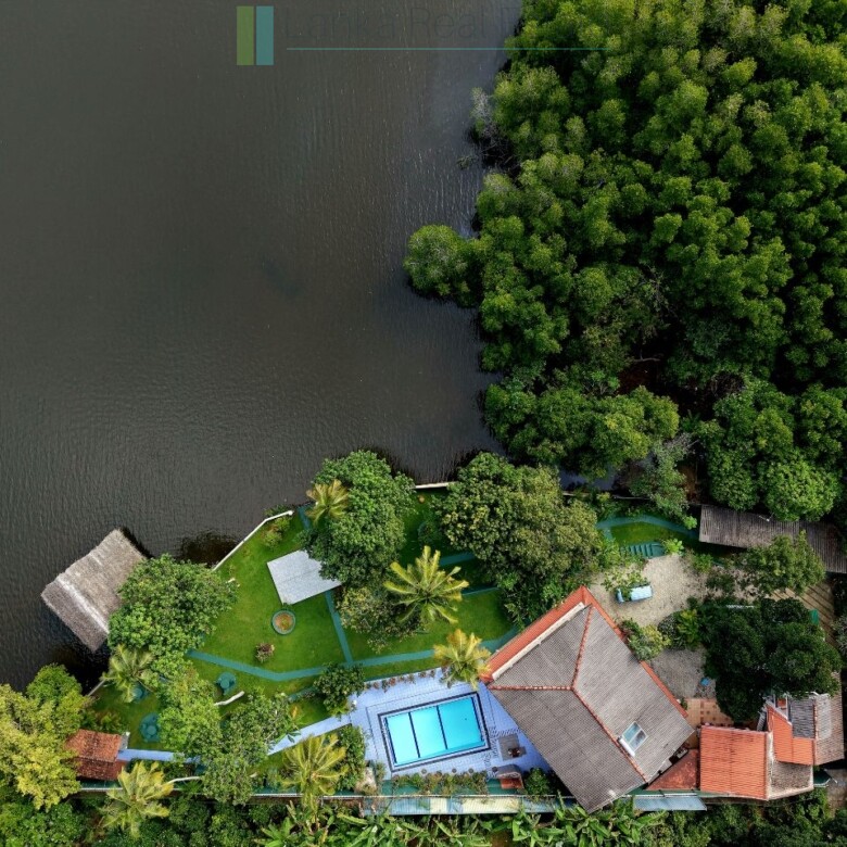 Secluded lakeside villa with private shoreline