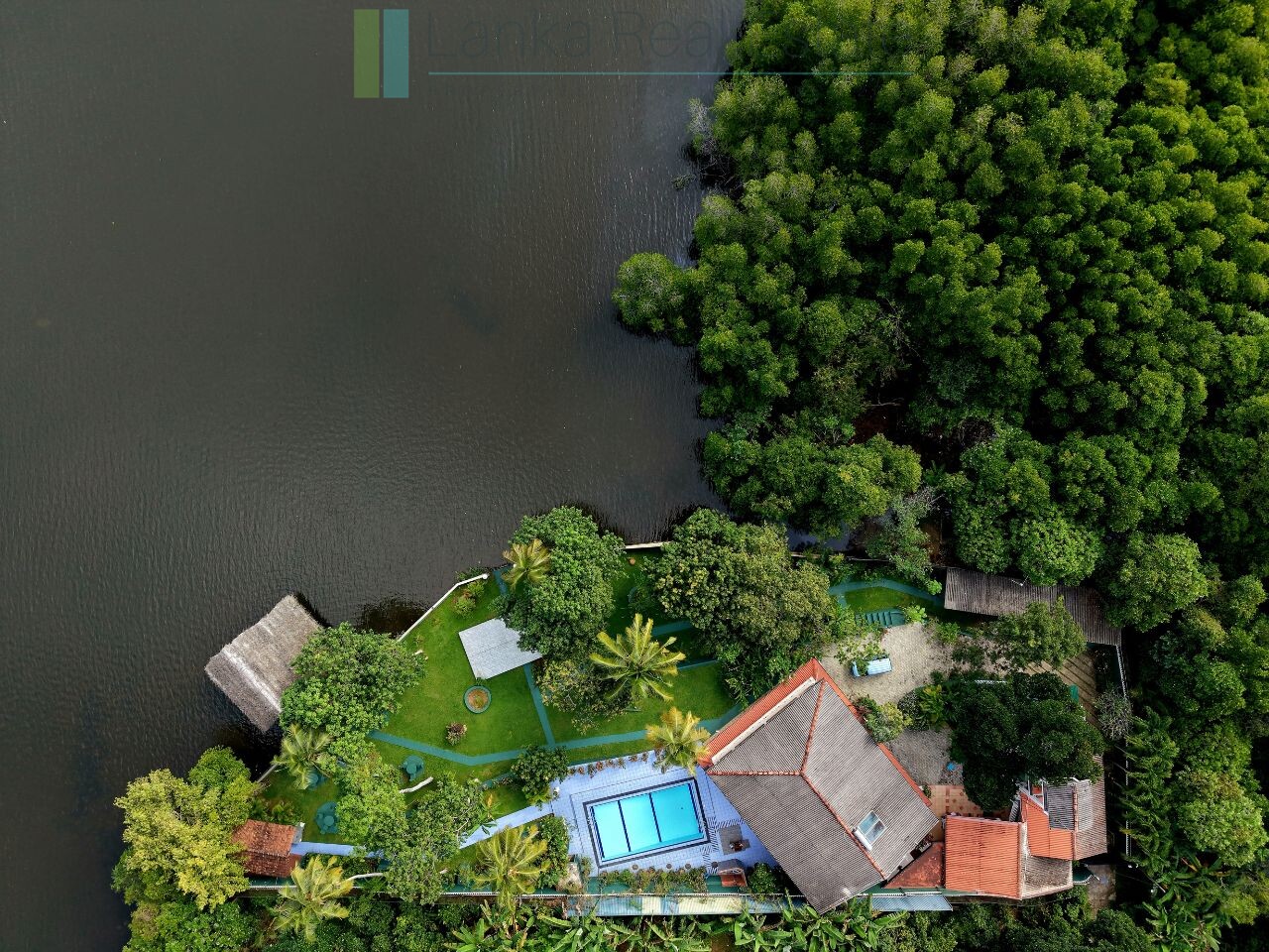 Secluded lakeside villa with private shoreline
