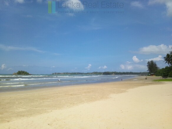 Substantial part-built beachfront hotel