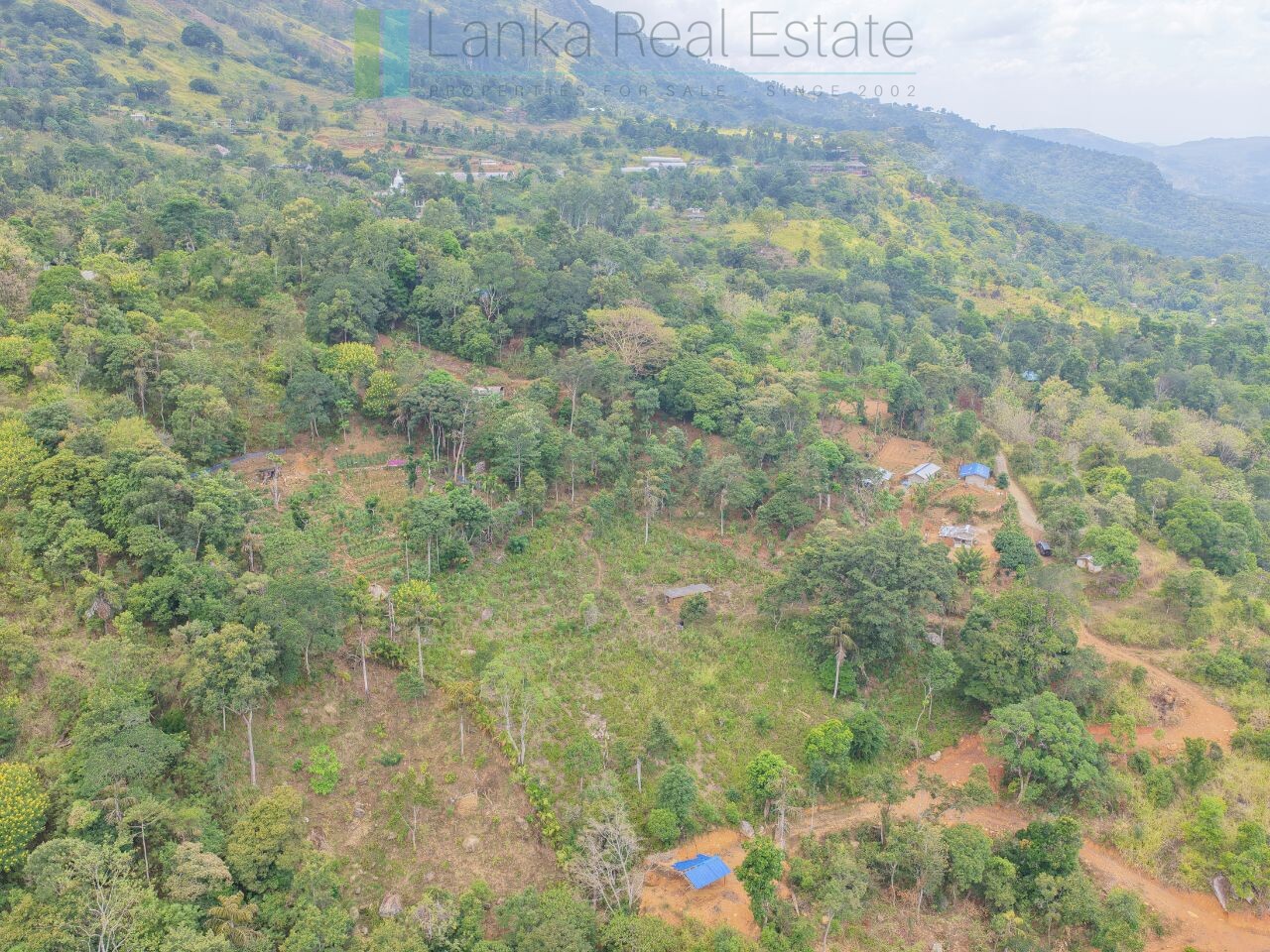 Sloping land with far-reaching views near Beragala