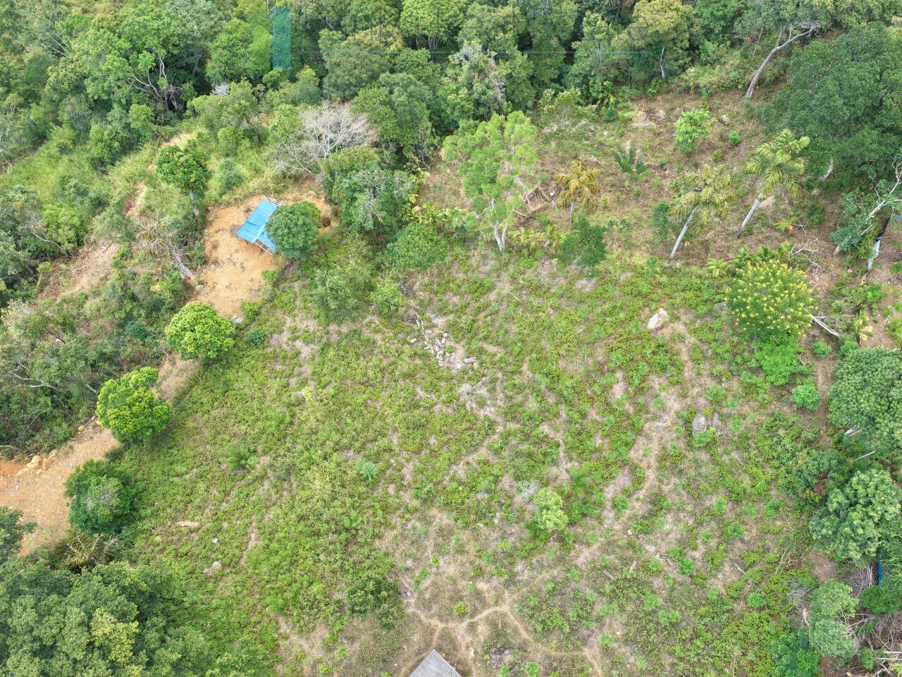 Sloping land with far-reaching views near Beragala